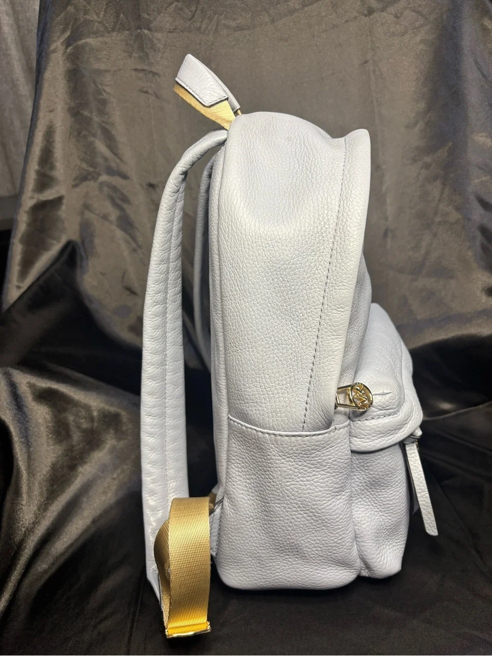 Michael Kors Slater Medium Pebbled Leather Backpack in a pale blue with dust bag